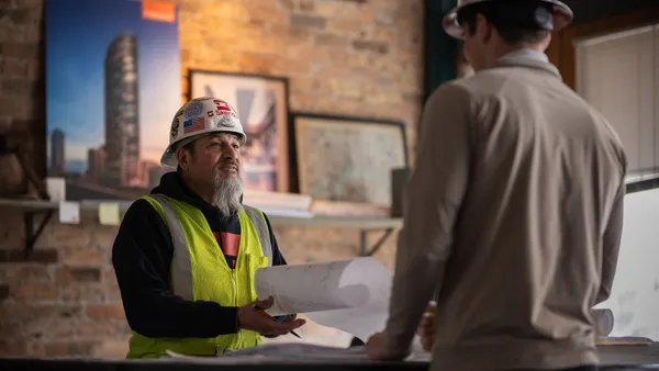 A seasoned professional gives advice to an early career worker.