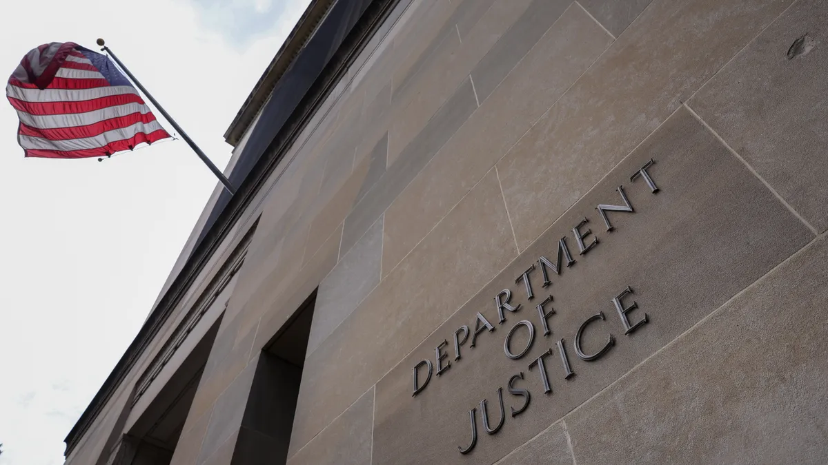 An exterior shot of the Department of Justice building shows the words "Department of Justice" and an American flag flying above.