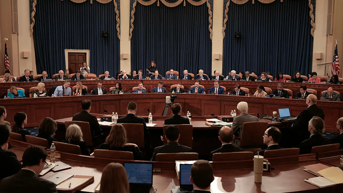 A wide shot of the House Ways and Means Committee meeting.
