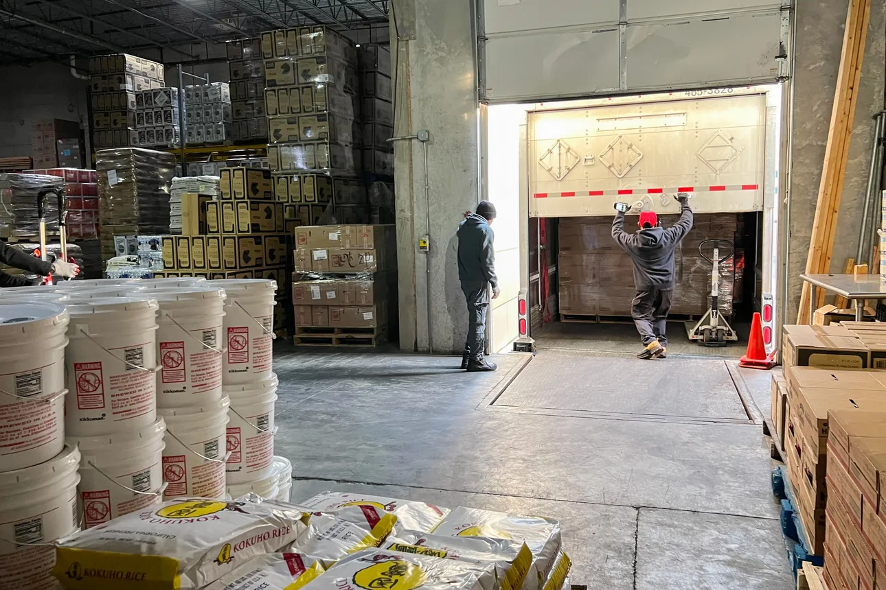 XPO driver Steadman &quot;Steve&quot; Mitchell makes a delivery at grocery distributor M&amp;K Food in Elkridge.