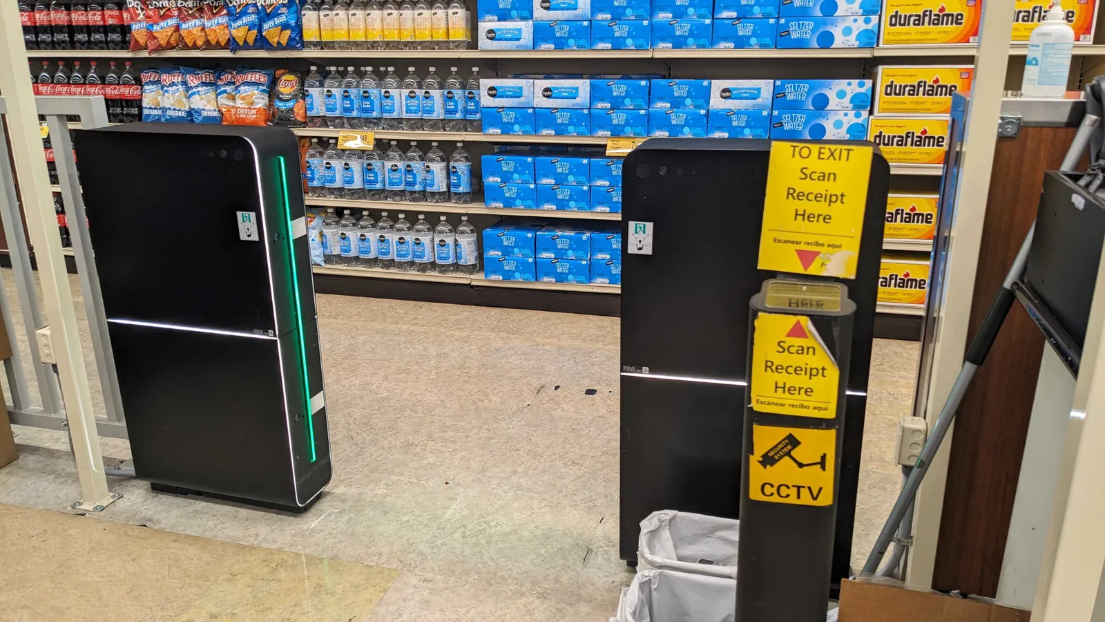 A receipt-scanning gate in a store.