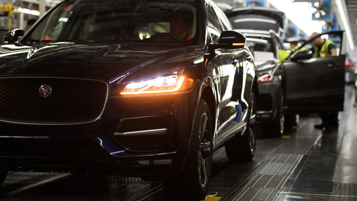 Vehicles are checked before moving to the next stage of production at the Jaguar Land Rover factory on March 1, 2017 in Solihull, England.