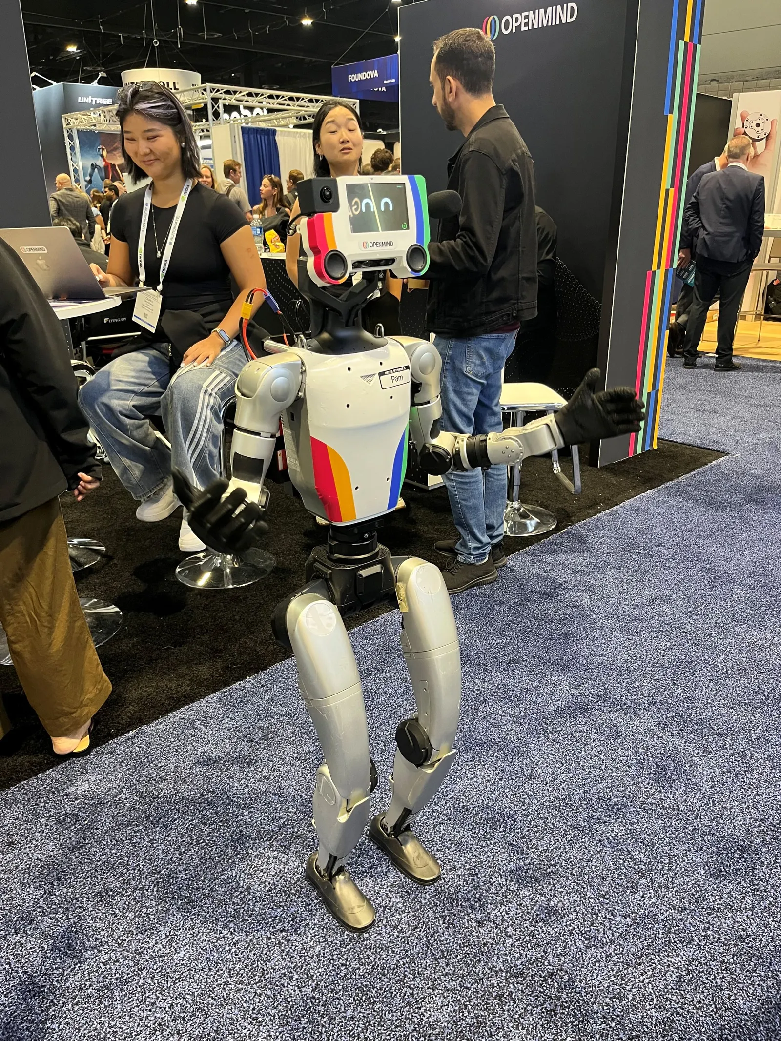 San Francisco-based startup OpenMind demonstrates its humanoid robot at Automate 2026 in Chicago.