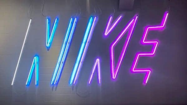 Neon Nike logo in a Chicago store.