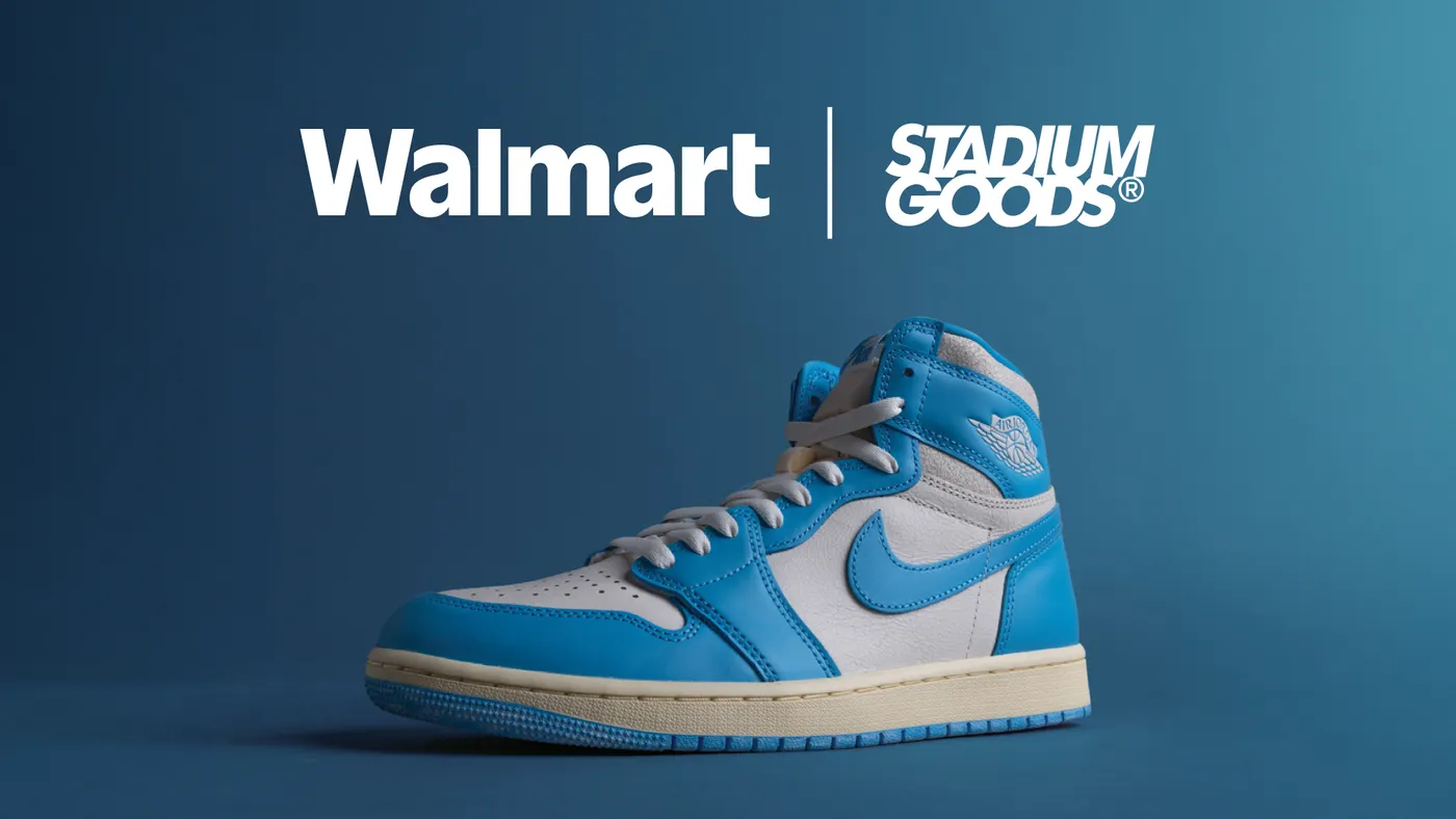 A blue and white Nike high top sneaker with the Walmart and Stadium Goods logos above
