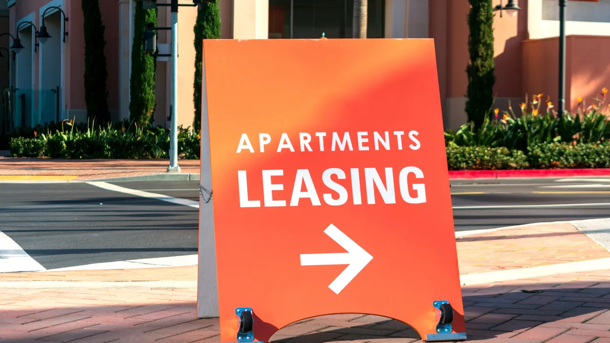 Orange apartments leasing sign