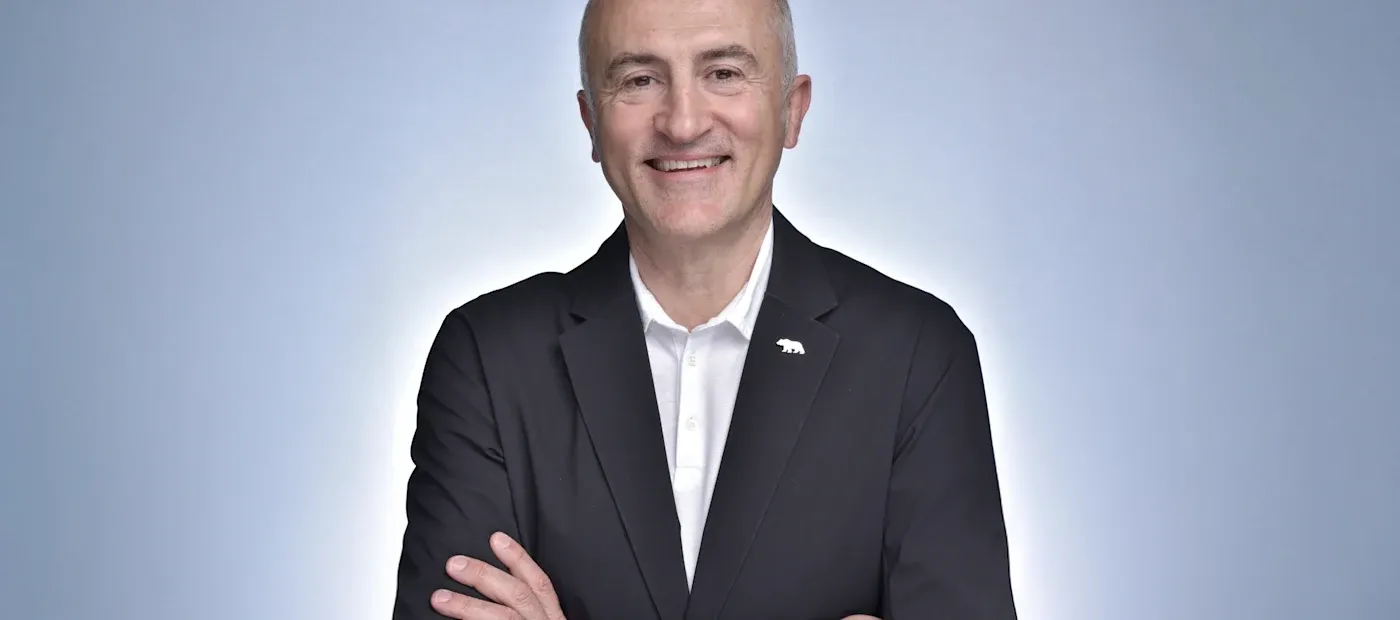 An executive headshot of Lucid Group's new CEO Silvio Napoli.