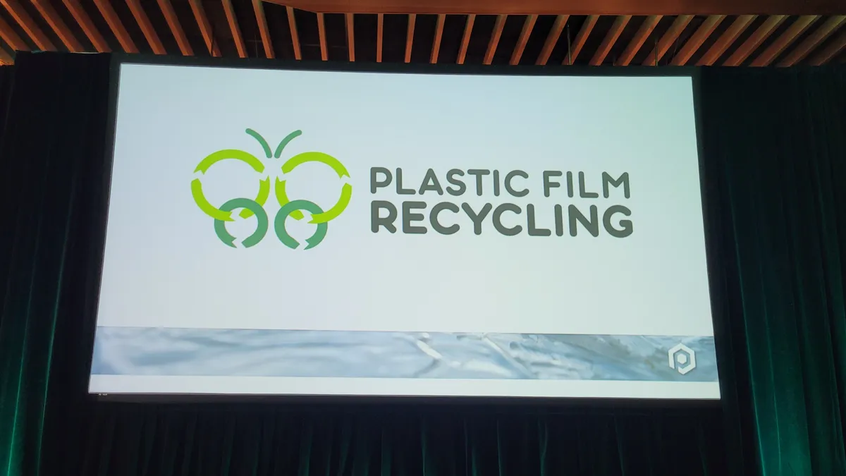 A logo modeled after a butterfly, next to the words "Plastic Film Recycling"