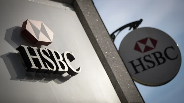 The HSBC sign and logo pictured outside a bank branch.