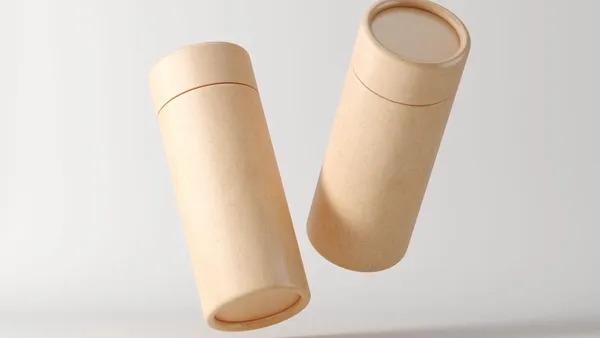 Pair of Craft Paper tubes with paper caps, cardboard containers for cosmetic packaging branding.