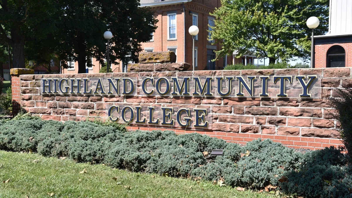 A large sign advertises Highland Community College