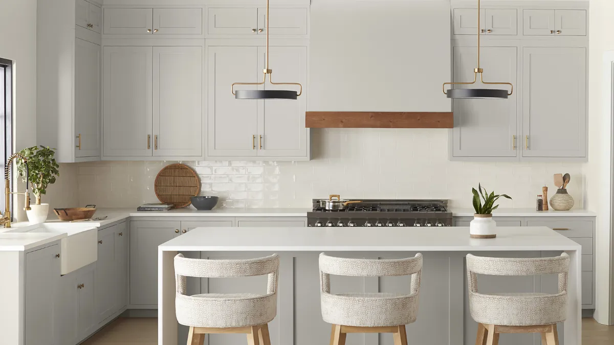 A kitchen painted in neutral shades.