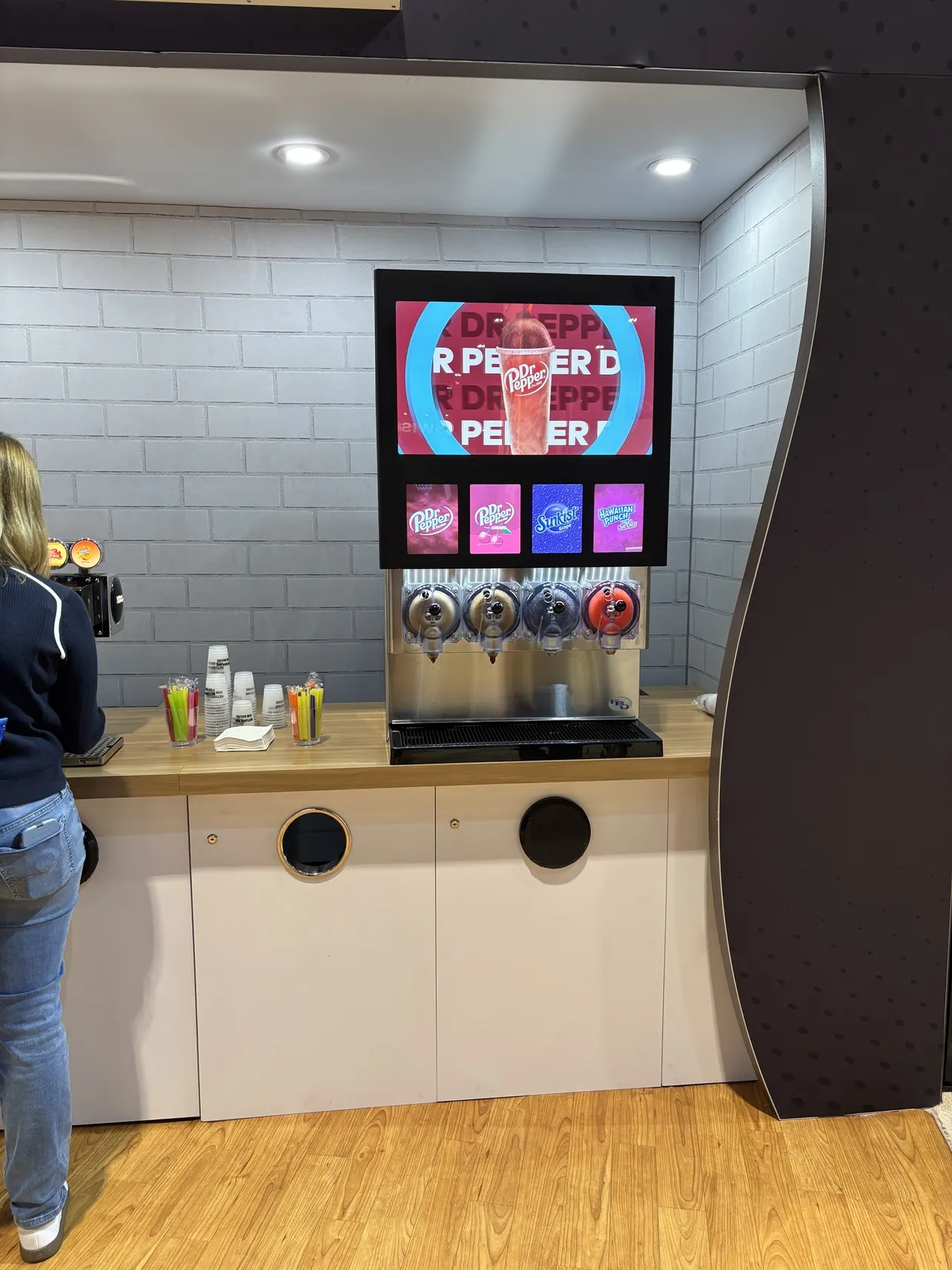A photo of a frozen beverage machine. Text on the machine says Dr Pepper