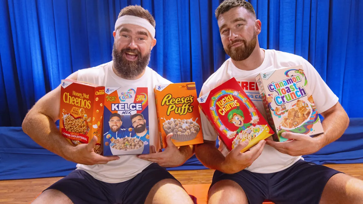 Jason and Travis Kelce are seen together holding a variety of General Mills cereals, including the new Kelce Mix cereal, as part of a General Mills partnership.