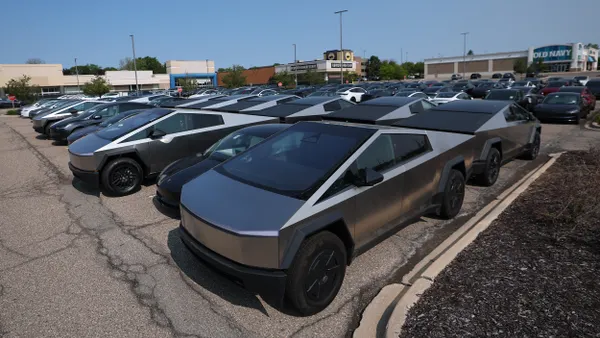 Tesla vehicles in a Michigan mall parking lot on June 2, 2025