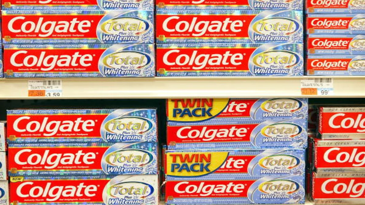 Packages of Colgate toothpaste are displayed on a shelf at a drug store February 3, 2004 in Chicago, Illinois.