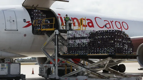 Flowers are being loaded onto an Avianca aircraft