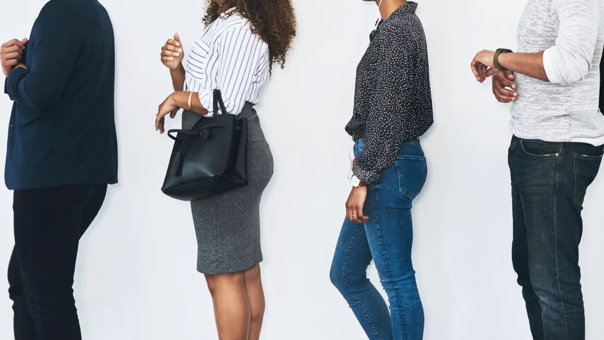 Job candidates wait in a line