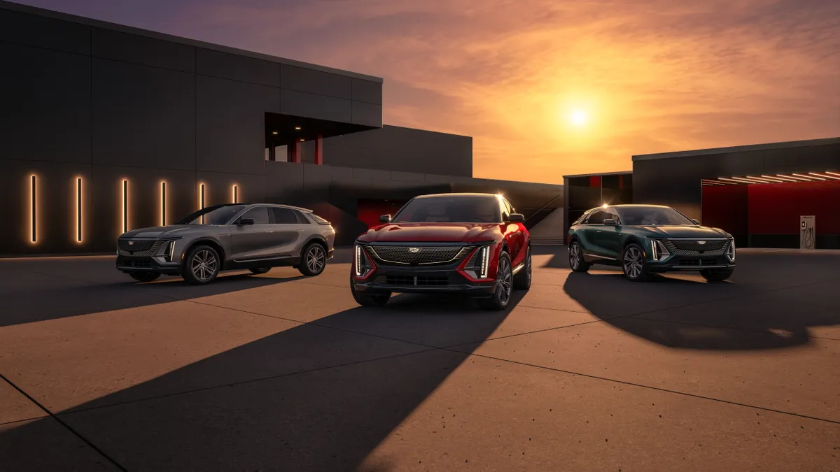 The 2024 Cadillac LYRIQ lineup showing the Tech, Luxury and Sport trim models with a setting sun in the background.