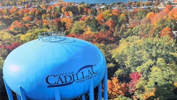Water tower bearing the logo for the City of Cadillac, Michigan.