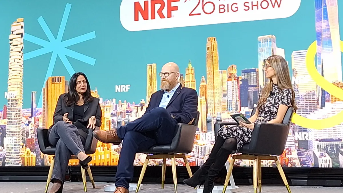 Executives from Fabletics and Sweetwater Sound on stage at NRF.
