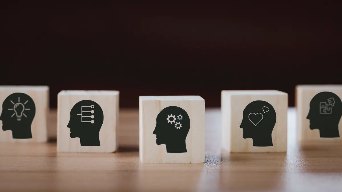 Wooden blocks with silhouettes of heads